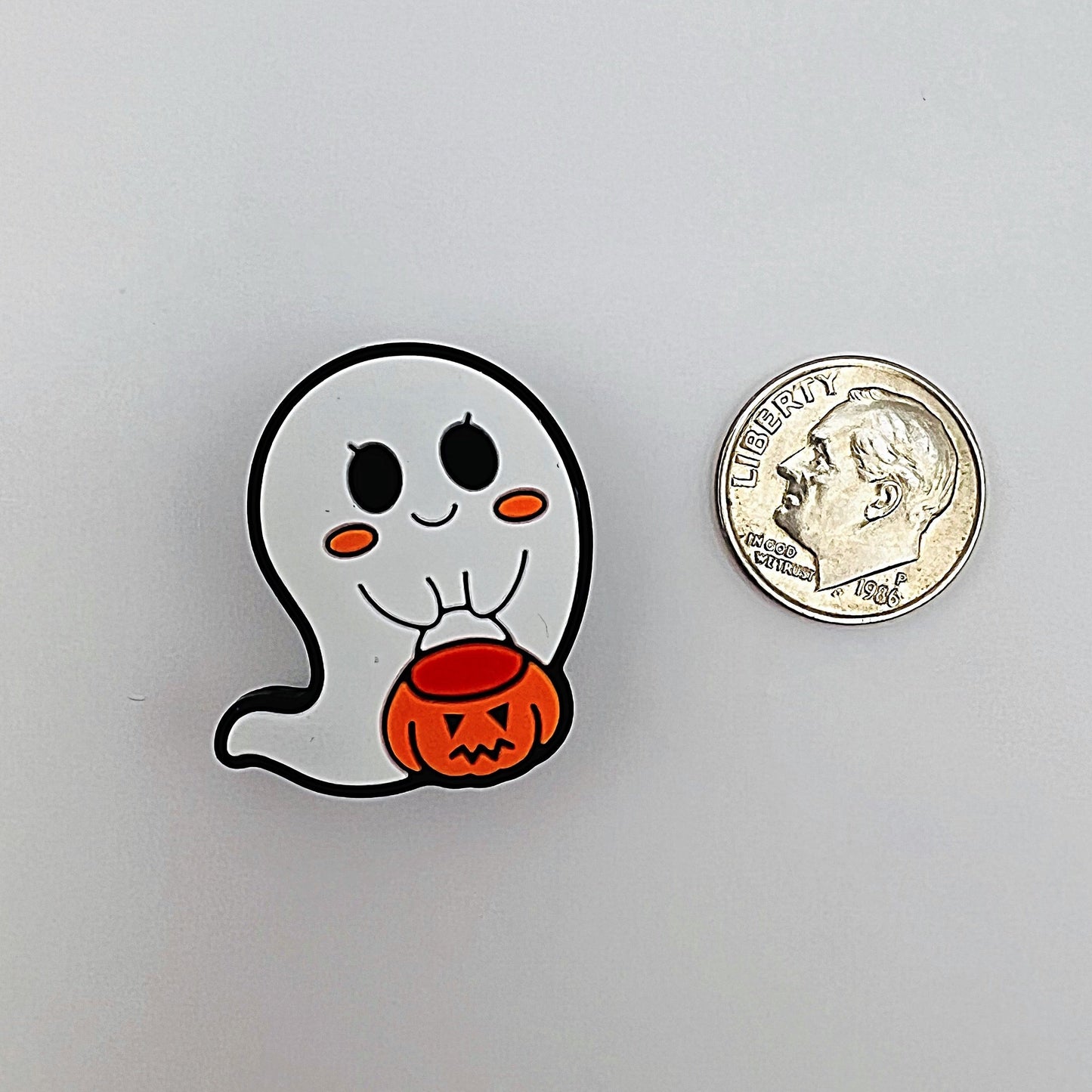 focal bead ghost holding pumpkin